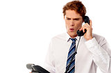 Frustrated business executive shouting
