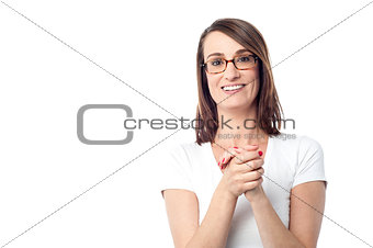 Attractive woman with her hands clasped