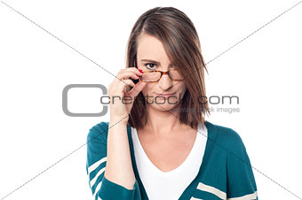 Attractive woman holding her eyeglasses