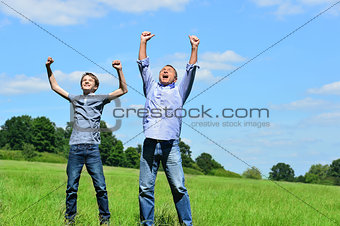 Enthusiastic father and son outdoors