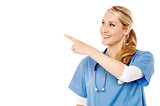 Happy young female doctor pointing away