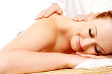 Pretty woman getting massage in a spa center