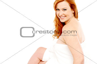 Woman wrapped towel, isolated on white