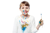 Cheerful little messy girl painter