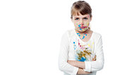 Serious girl with paint on face
