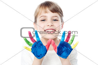 Cute girl with hands painted
