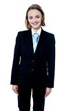 Smiling girl posing in business suit