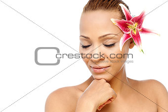Young woman with lily flower