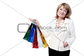 Senior woman with shopping bags