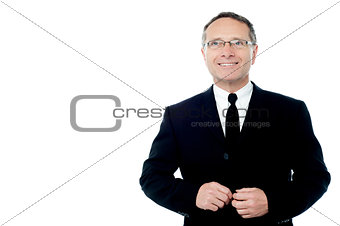 Businessman posing to camera over white