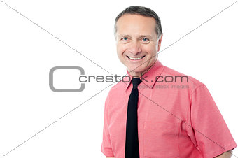 Senior businessman smiling to camera