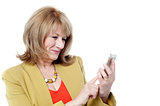 Senior woman looking at her cell phone
