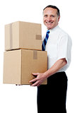 Business executive holding a boxes