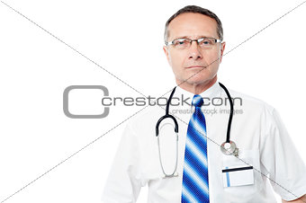 Aged male doctor with lab coat