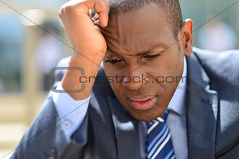 Stressful businessman at outdoors