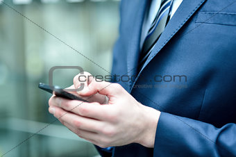 Close up of a man using mobile phone