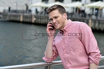 Young man talking on the cell phone
