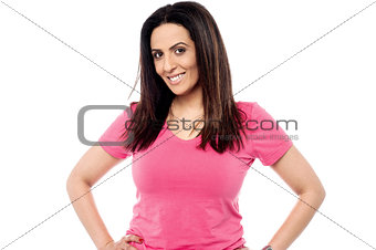 Smiling woman with her hands on her hip