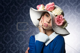 spring woman posing with fashion hat