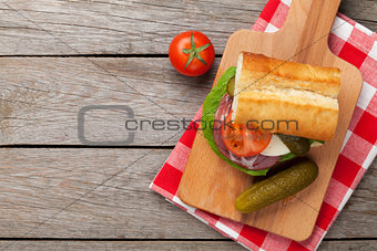 Sandwich with salad, ham, cheese, cucumber and tomatoes
