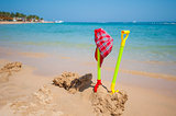 Childrens toys on a tropical beach