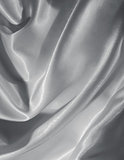 Smooth elegant grey silk or satin as background 