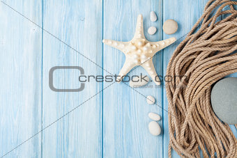 Sea vacation background with star fish and marine rope