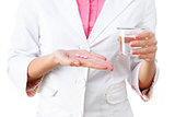 Medicines in hand close-up.