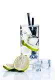 Cocktail with ice and lime slice isolated