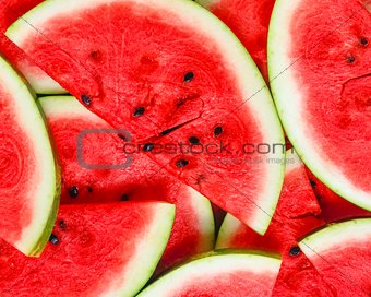 Abstract background with slices of fresh ripe red