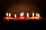 candles lighting in the darkness