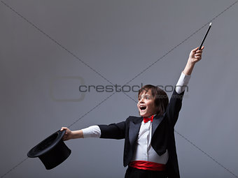 Young magician performing a trick