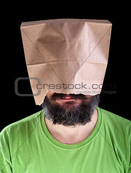 Bearded man with paper bag on his head smiling