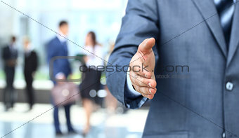 Businessman extending hand to shake