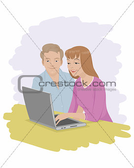 Couple in front of laptop
