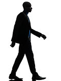 african black man walking serious silhouette