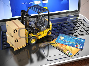 Concept of delivering, shipping or logistics. Forklift on laptop