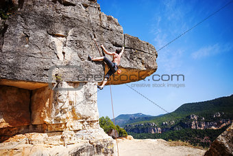 Male rock climber on a cliff