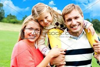 Beautiful happy caucasian family of three