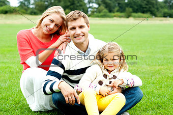 Outdoor happy caucasian family relaxing