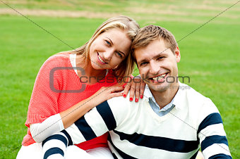 Adorable love couple, woman embracing her man