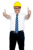 Business architect showing double thumbs up