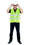 Construction worker in fluorescent jacket