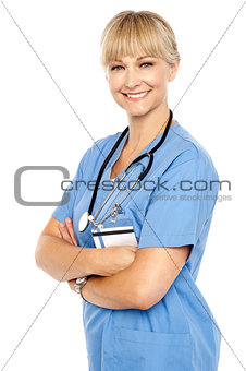 Happy and confident doctor posing arms crossed