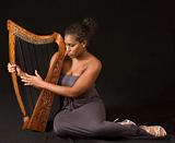 African-American woman with harp