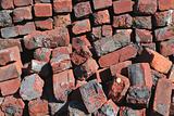 Old red brick pile background