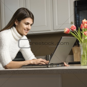 Woman with laptop.