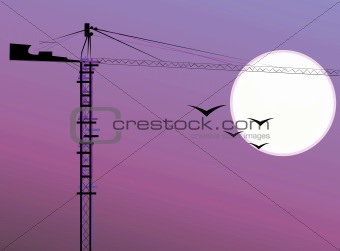 construction crane under moonlight