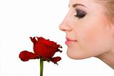 Woman smelling flower