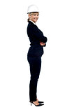 Female business architect posing sideways